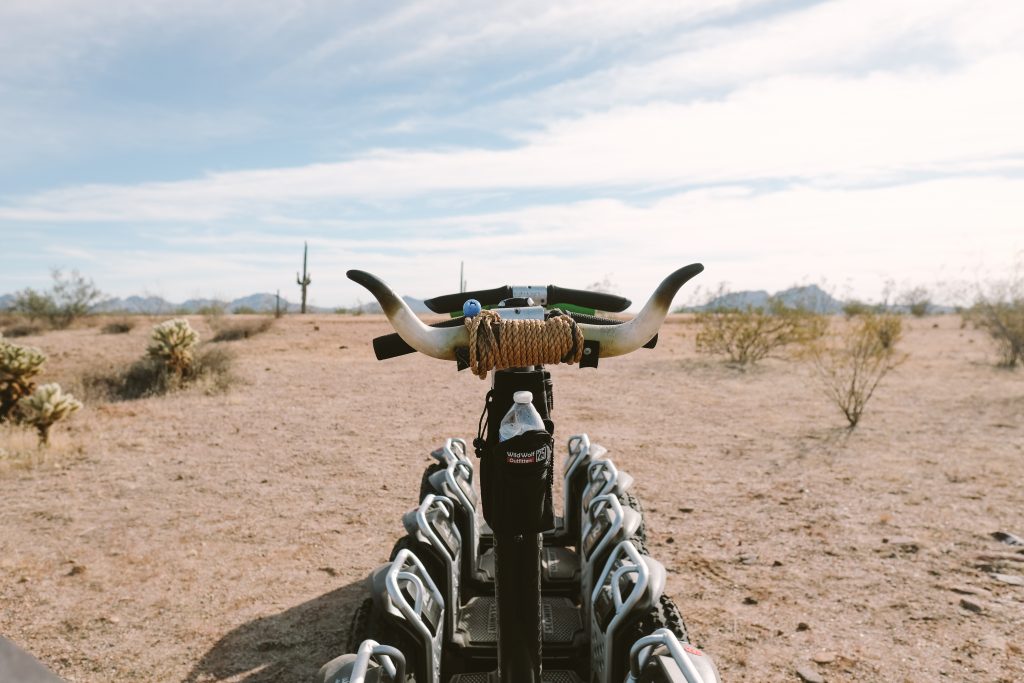 A photo of a Segway in the desert