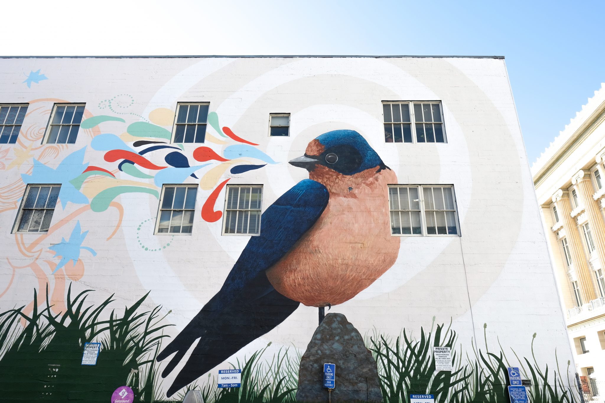 blue and tan bird mural